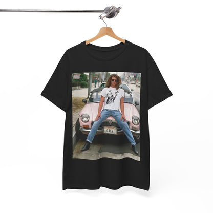 A black graphic t-shirt featuring a vintage photo of INXS band members with a classic car.