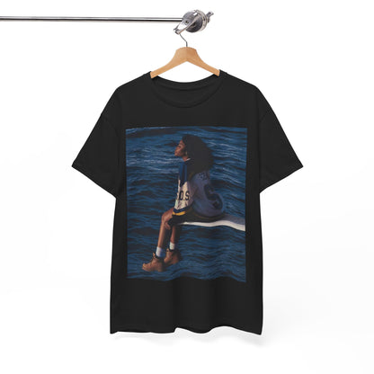 A black graphic t-shirt featuring a graphic related to SZA's 'SOS' album.