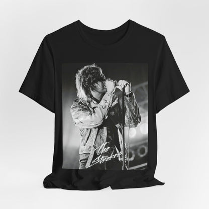 A black graphic t-shirt featuring a vintage graphic related to The Strokes' 'Last Nite' song or era.