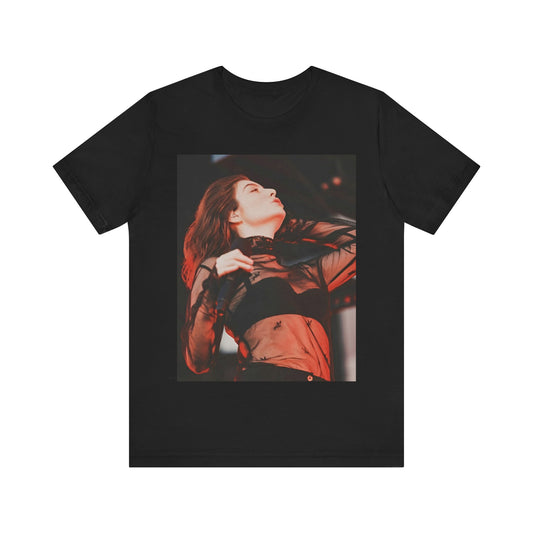 A black graphic t-shirt featuring a graphic of Lorde emphasizing raw emotion.