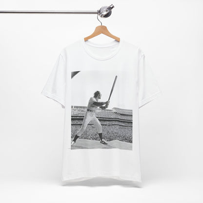A black graphic t-shirt featuring a black and white graphic or photo related to Elton John's 1975 tour in America.