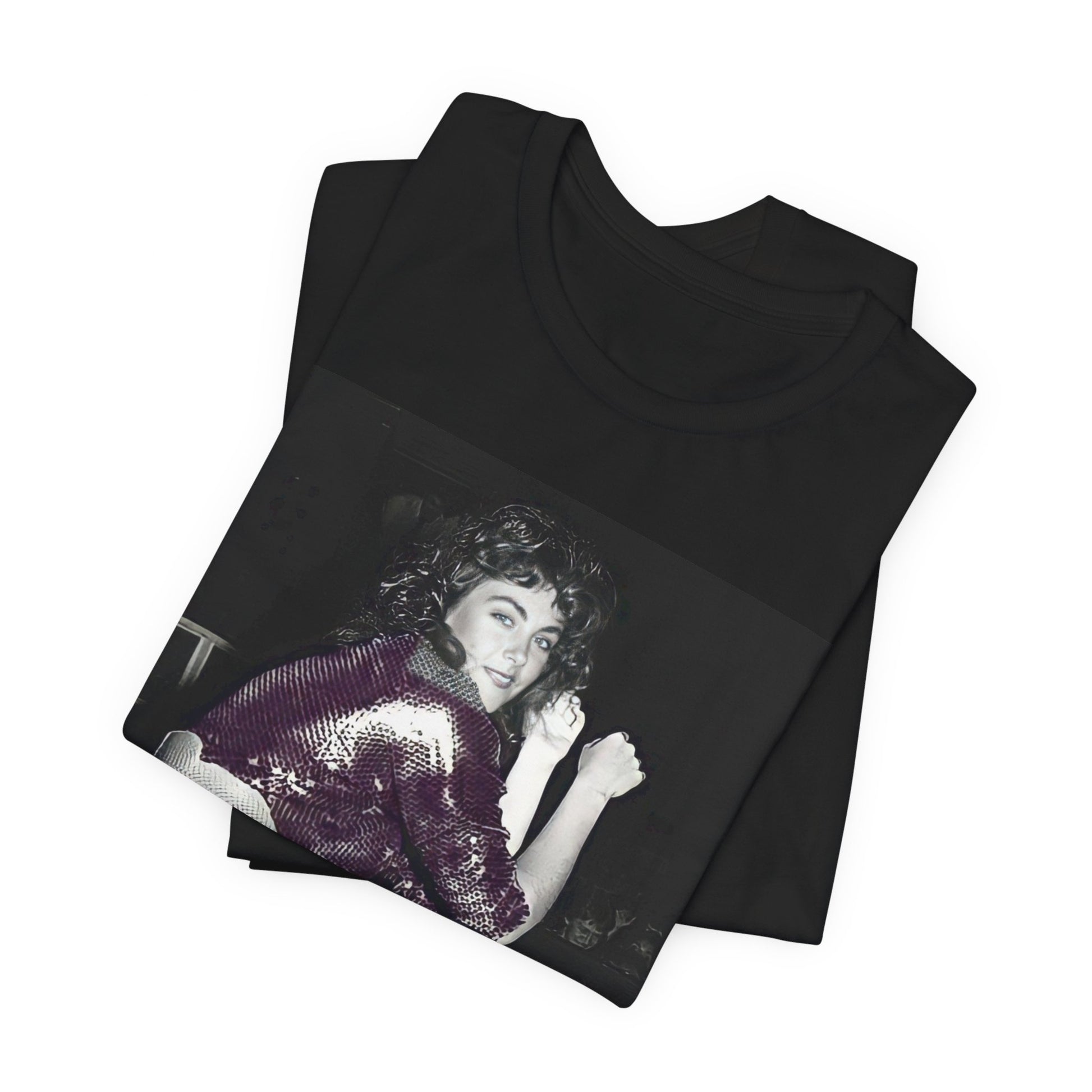 A black graphic t-shirt featuring a graphic of Laura Branigan as an 80s disco pop queen.