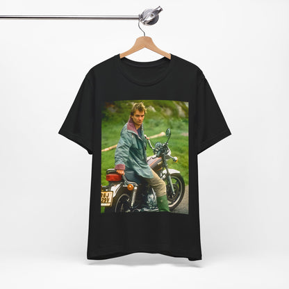 A black graphic t-shirt featuring a graphic of Sting from The Police with a motorcycle theme.