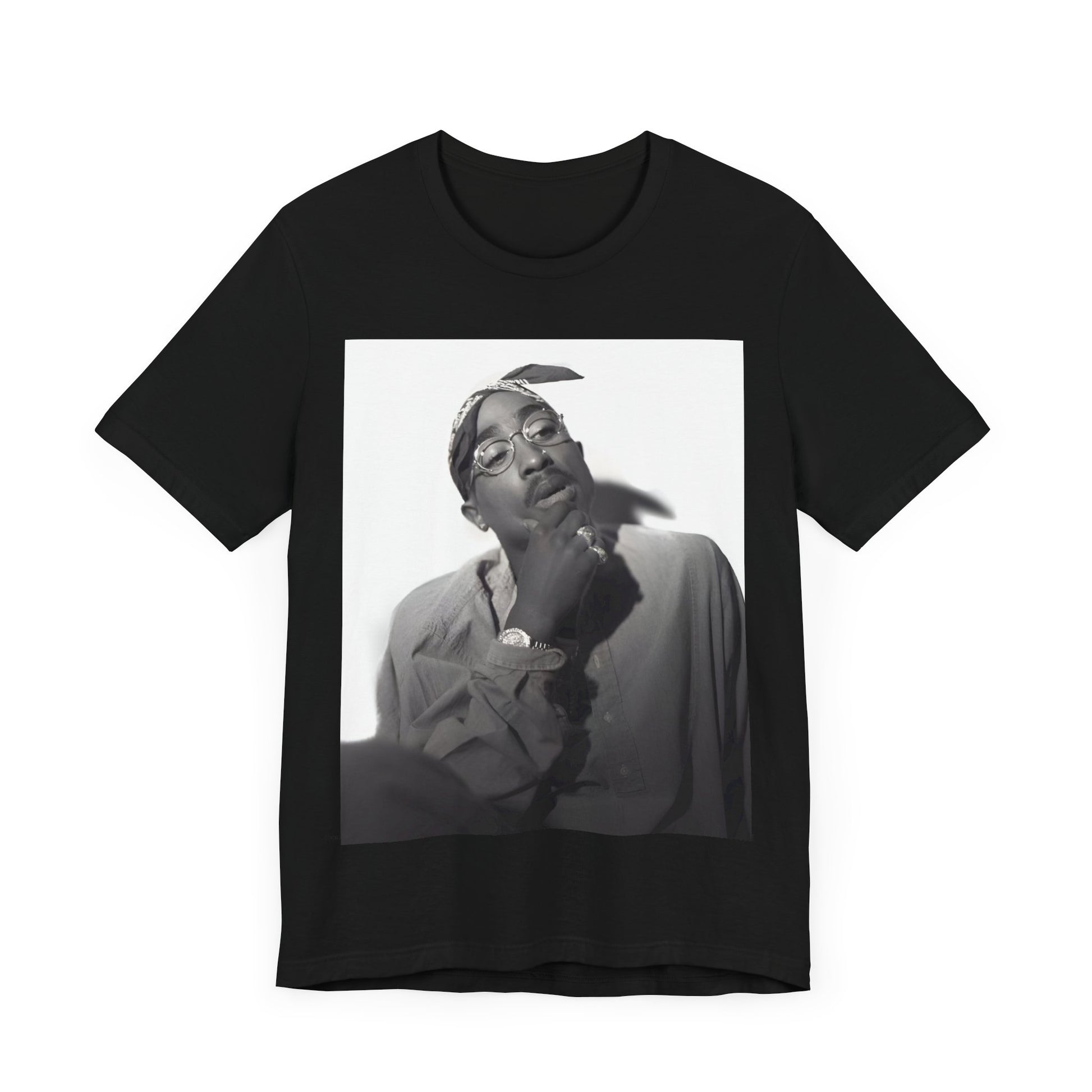 A black graphic t-shirt featuring a classic 90s West Coast rap graphic of Tupac.