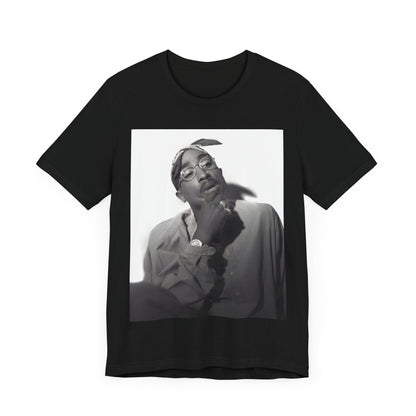 A black graphic t-shirt featuring a classic 90s West Coast rap graphic of Tupac.