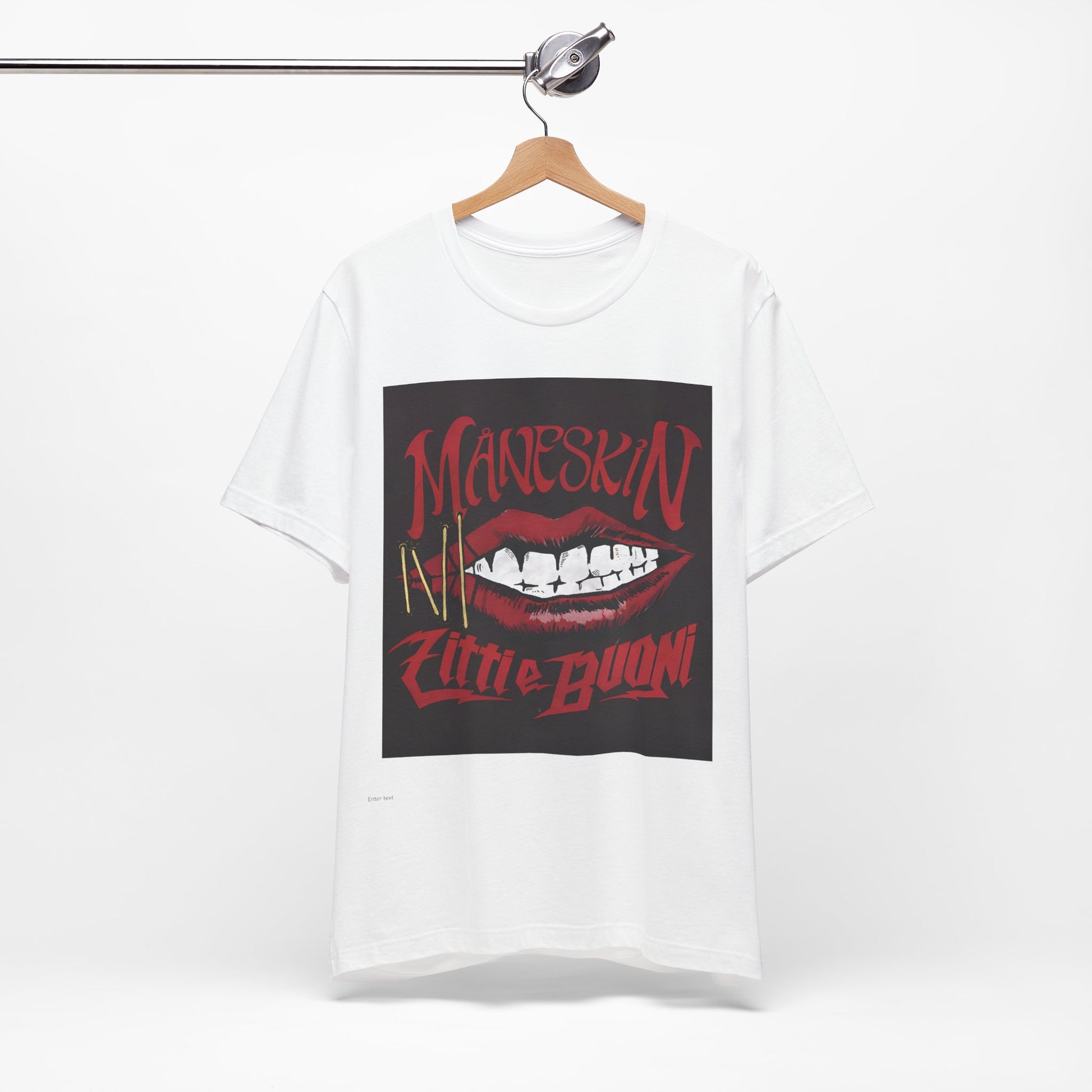 A black graphic t-shirt featuring a graphic related to Maneskin's song "Zitti E Buoni."
