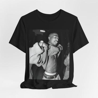 A black graphic t-shirt featuring a vintage hip hop icon graphic of Tupac.