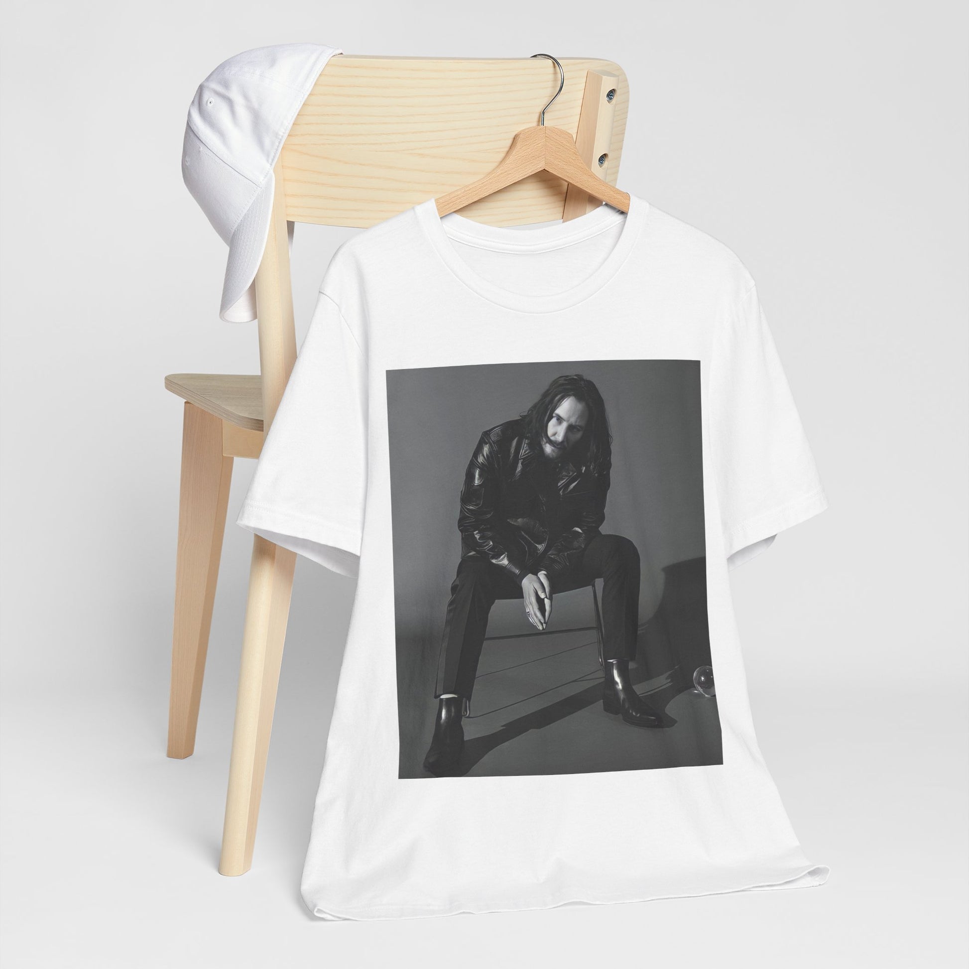 A black graphic t-shirt featuring a graphic of Keanu Reeves as John Wick.