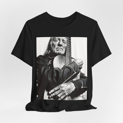 A black graphic t-shirt featuring a vintage country legend graphic of Willie Nelson.