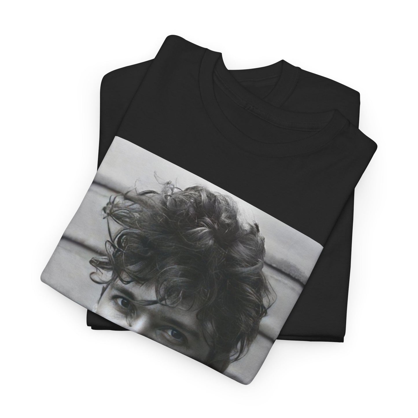 A black graphic t-shirt featuring a retro black and white graphic or photo of Michael Hutchence from INXS.