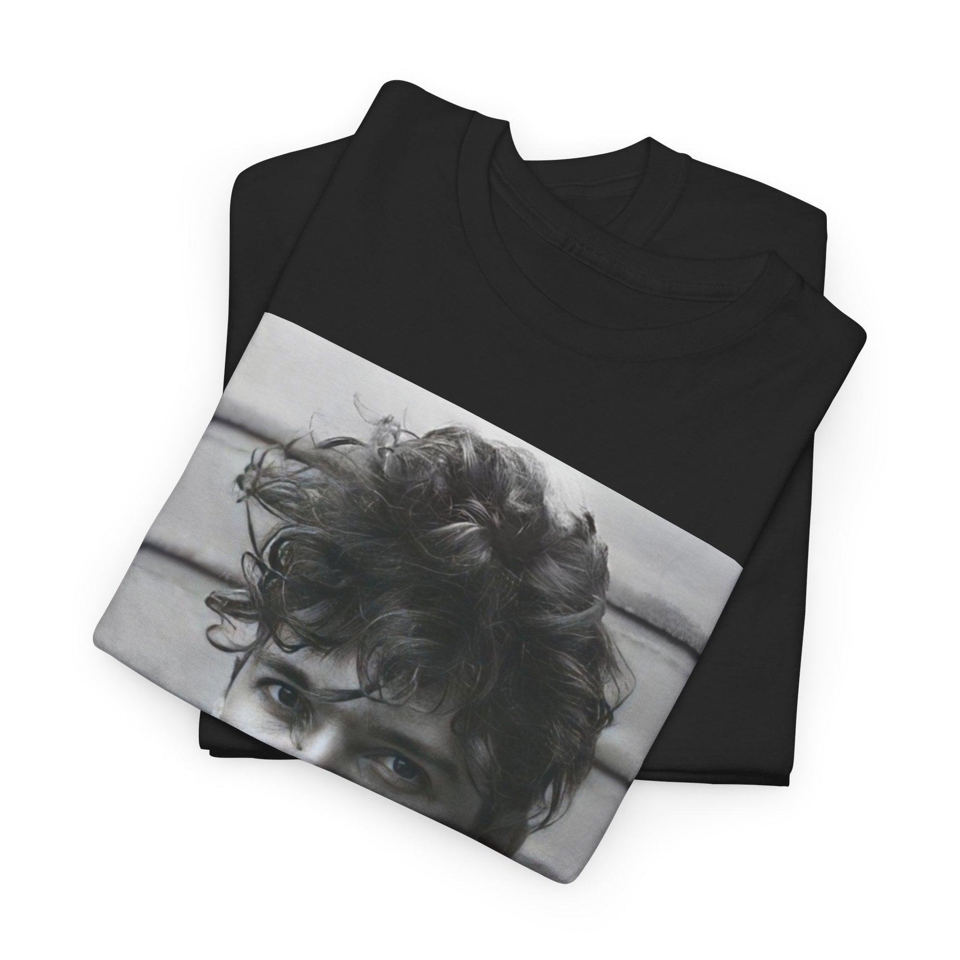 A black graphic t-shirt featuring a retro black and white graphic or photo of Michael Hutchence from INXS.