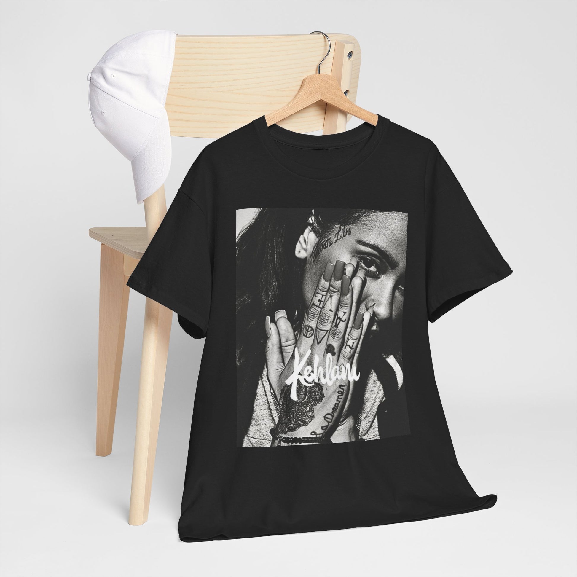 A black graphic t-shirt featuring a casual R&B fan graphic of Kehlani.