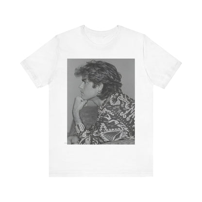 A black graphic t-shirt featuring a graphic of George Michael from his 80s Wham! era.
