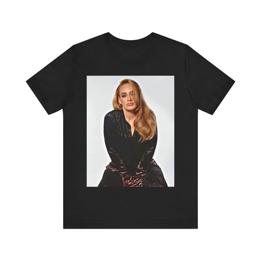 A black graphic t-shirt featuring a portrait of Adele from her iconic blonde era, with her hair styled and her expression poised and elegant.