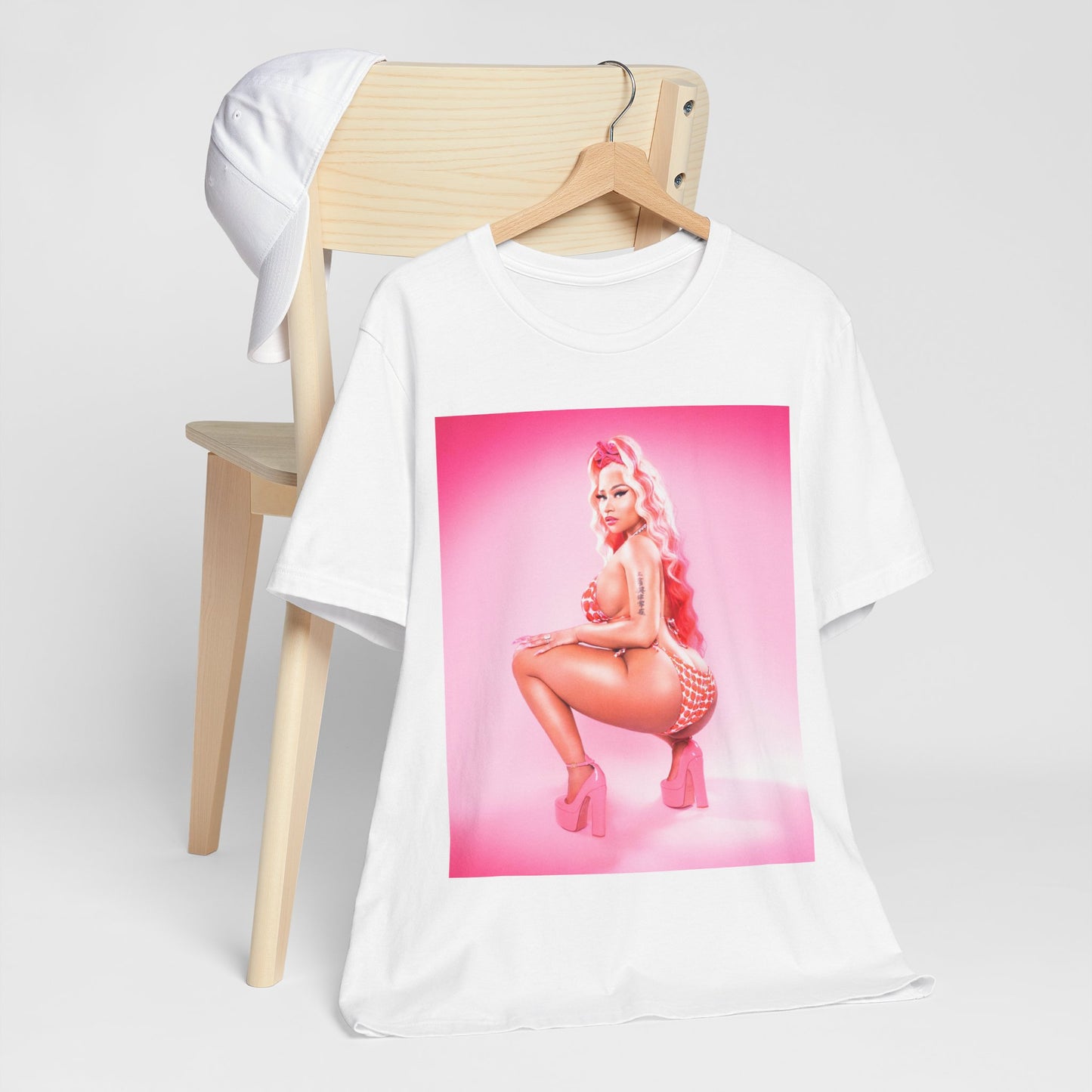 A black graphic t-shirt featuring a graphic related to Nicki Minaj's 'Anaconda' song or era.