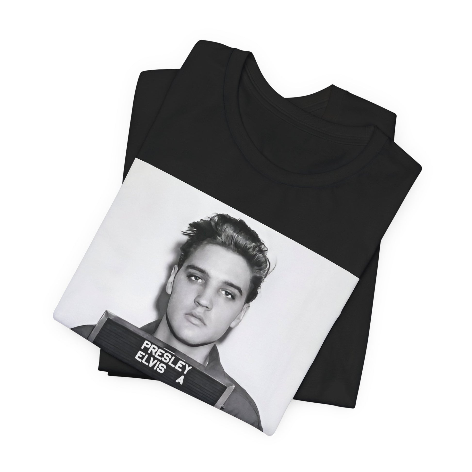 A black graphic t-shirt featuring a retro mugshot photo of Elvis Presley.