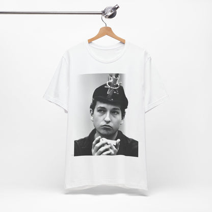 A black graphic t-shirt featuring a graphic of Bob Dylan in an acoustic session setting, possibly with his guitar.