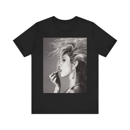 A black graphic t-shirt featuring a graphic of Miley Cyrus as a grunge rockstar.