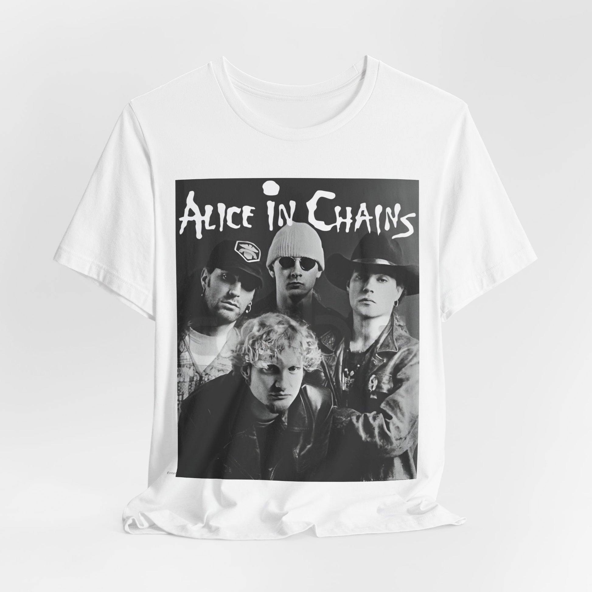 A black graphic t-shirt featuring a black and white photographic portrait of the band Alice In Chains, capturing their iconic grunge look.