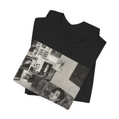 A black graphic t-shirt featuring a black and white portrait photo of Jimin.
