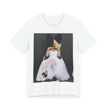 A black graphic t-shirt featuring a graphic of Sia's iconic wig style.