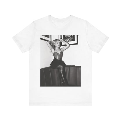 A black graphic t-shirt featuring a black and white graphic of Sabrina Carpenter as a pop princess.