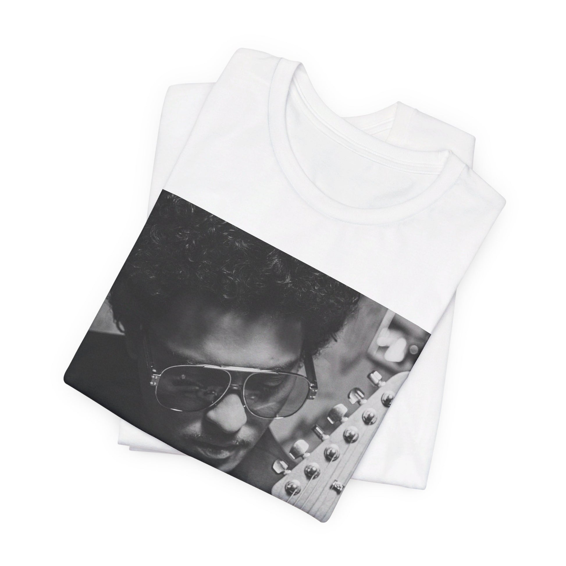 A black graphic t-shirt featuring a graphic of Bruno Mars in a classic crooner style.