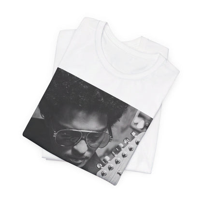 A black graphic t-shirt featuring a graphic of Bruno Mars in a classic crooner style.