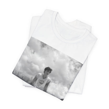 A black graphic t-shirt featuring a graphic of Shawn Mendes in an iconic tank top look.