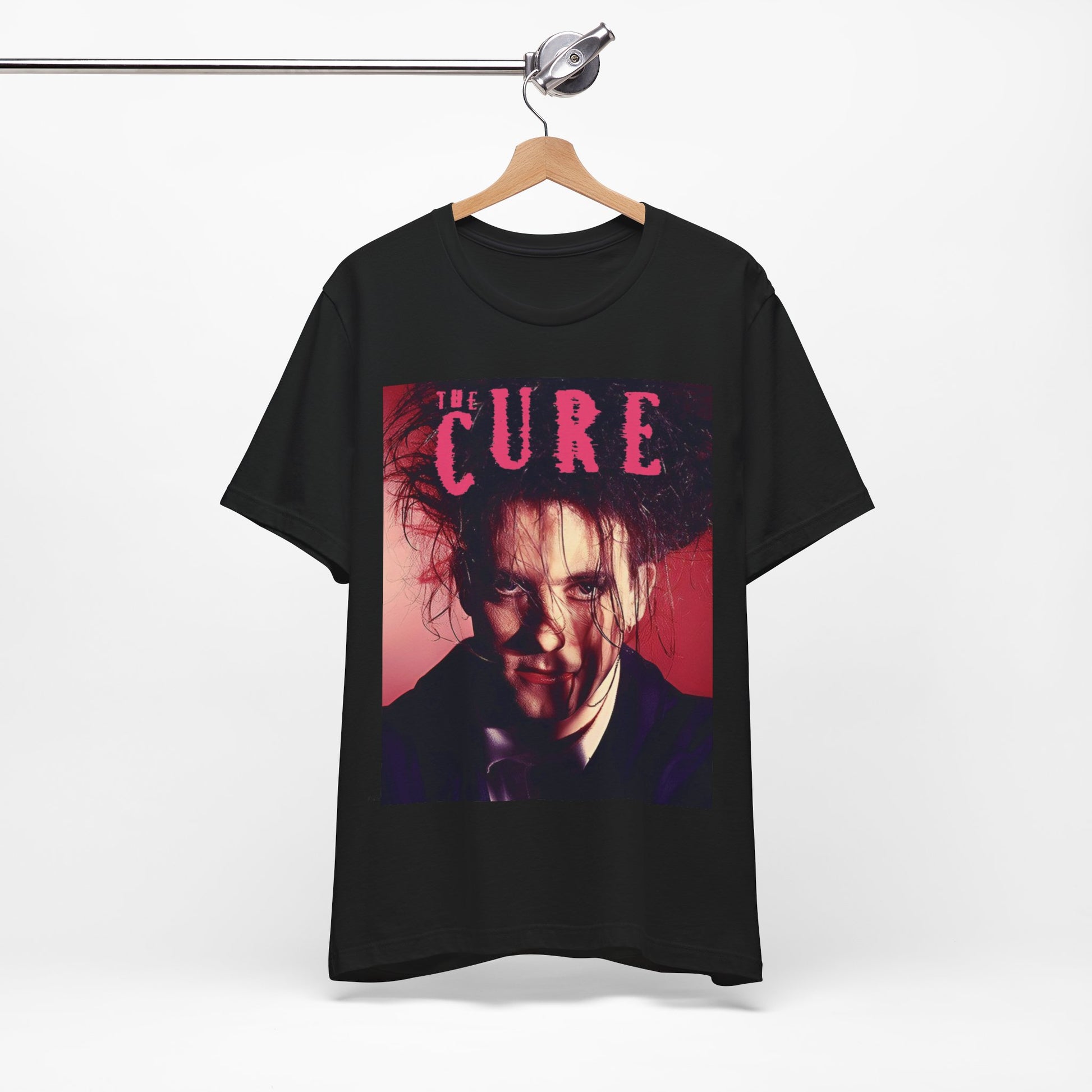A black graphic t-shirt featuring a vintage graphic related to The Cure's 'Just Like Heaven' song or era.
