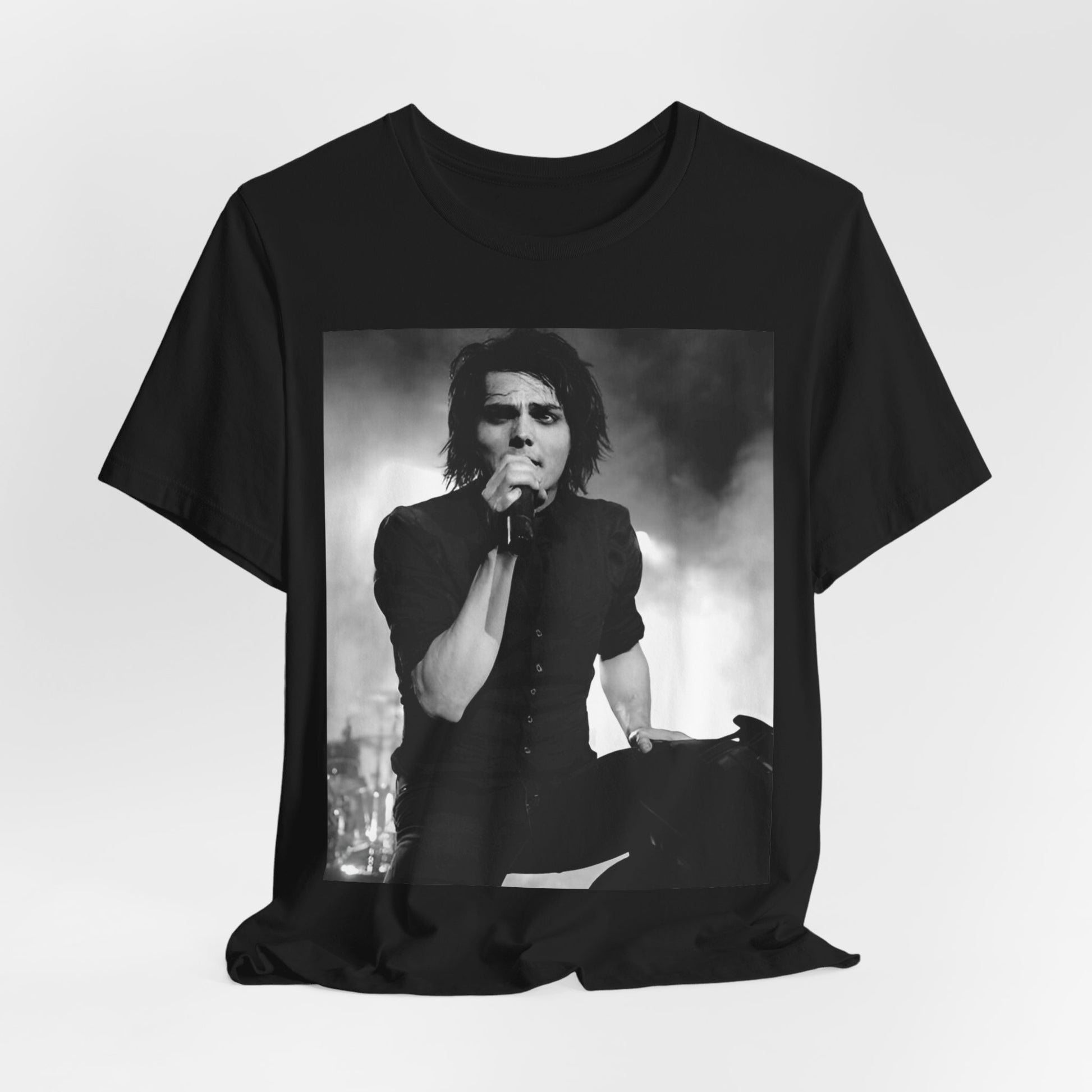 A black graphic t-shirt featuring a black and white graphic or photo of My Chemical Romance performing live in concert.