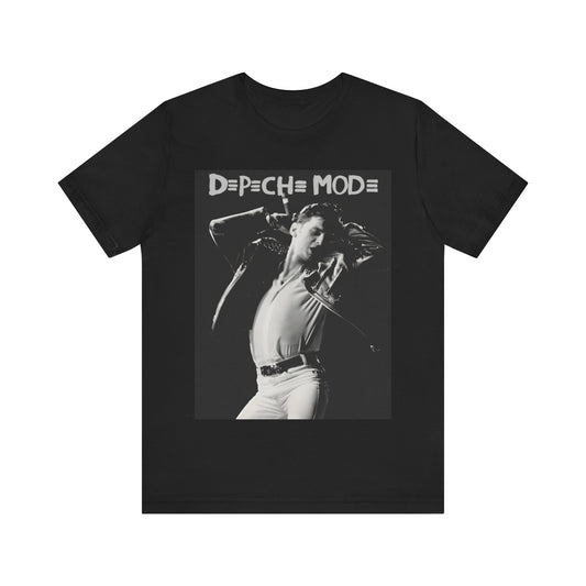 A black graphic t-shirt featuring a black and white graphic or photo of Depeche Mode performing live on stage.