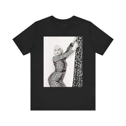 A black graphic t-shirt featuring a black and white, wild-style graphic of Blondie, emphasizing their untamed spirit.