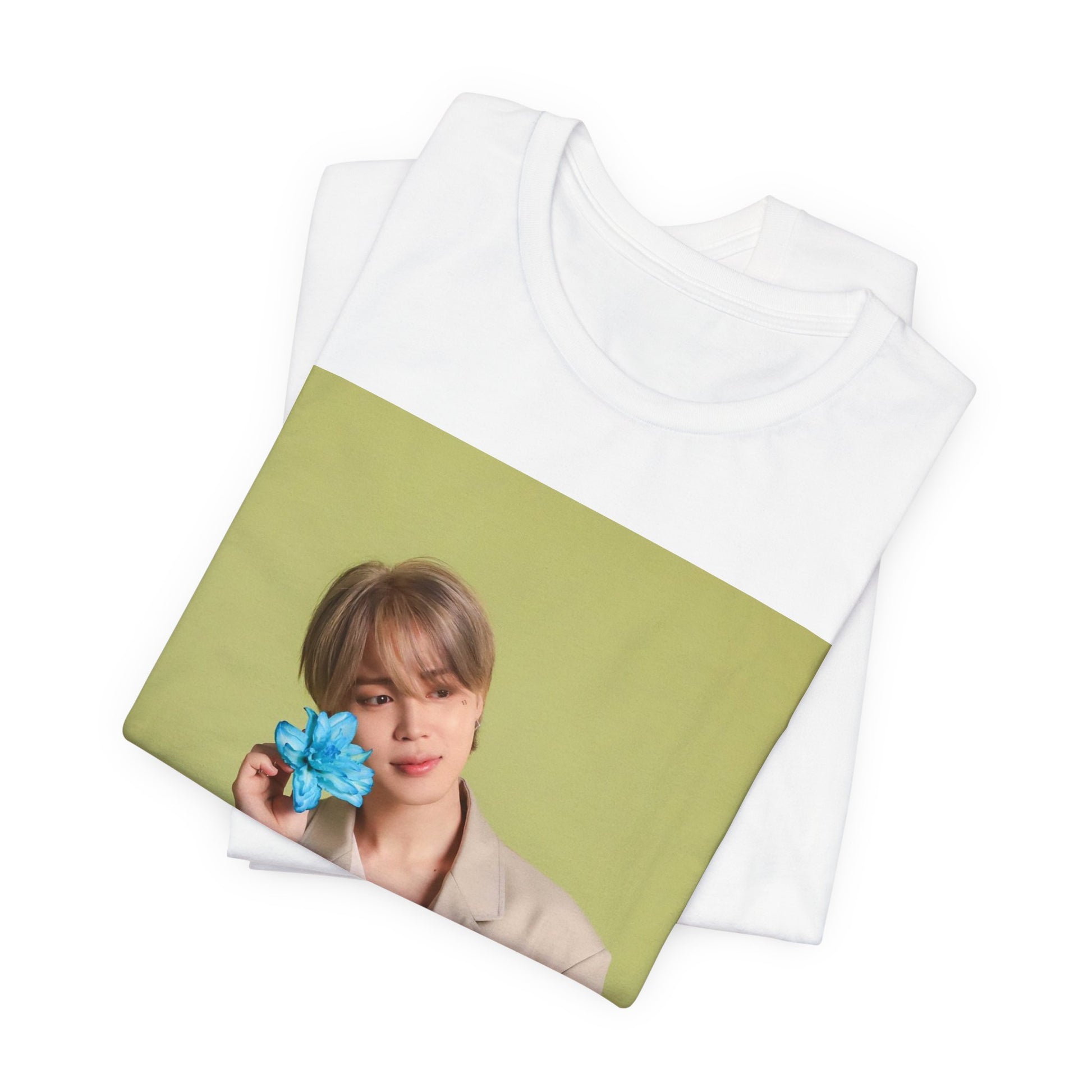 A black graphic t-shirt featuring a vintage K-Pop aesthetic graphic of Jimin.