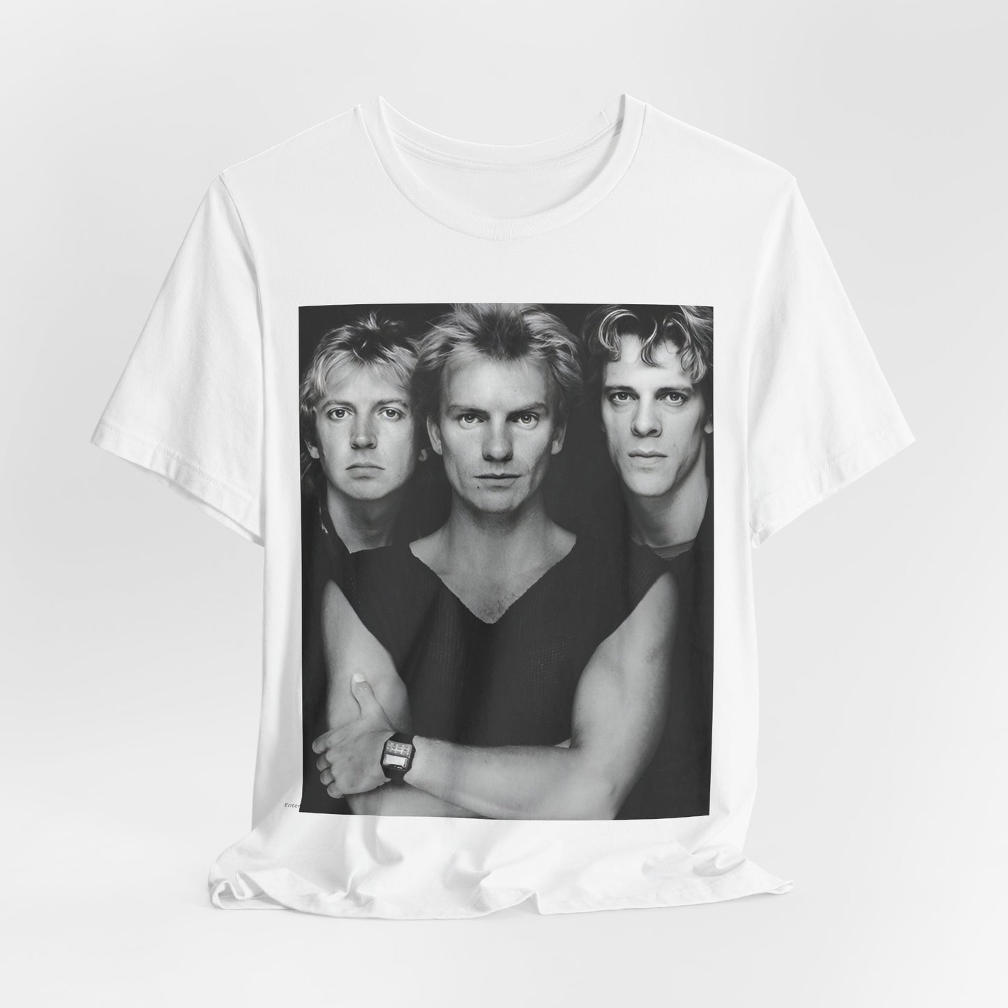 A black graphic t-shirt featuring a graphic related to The Police's 'Every Breath You Take' song or era.