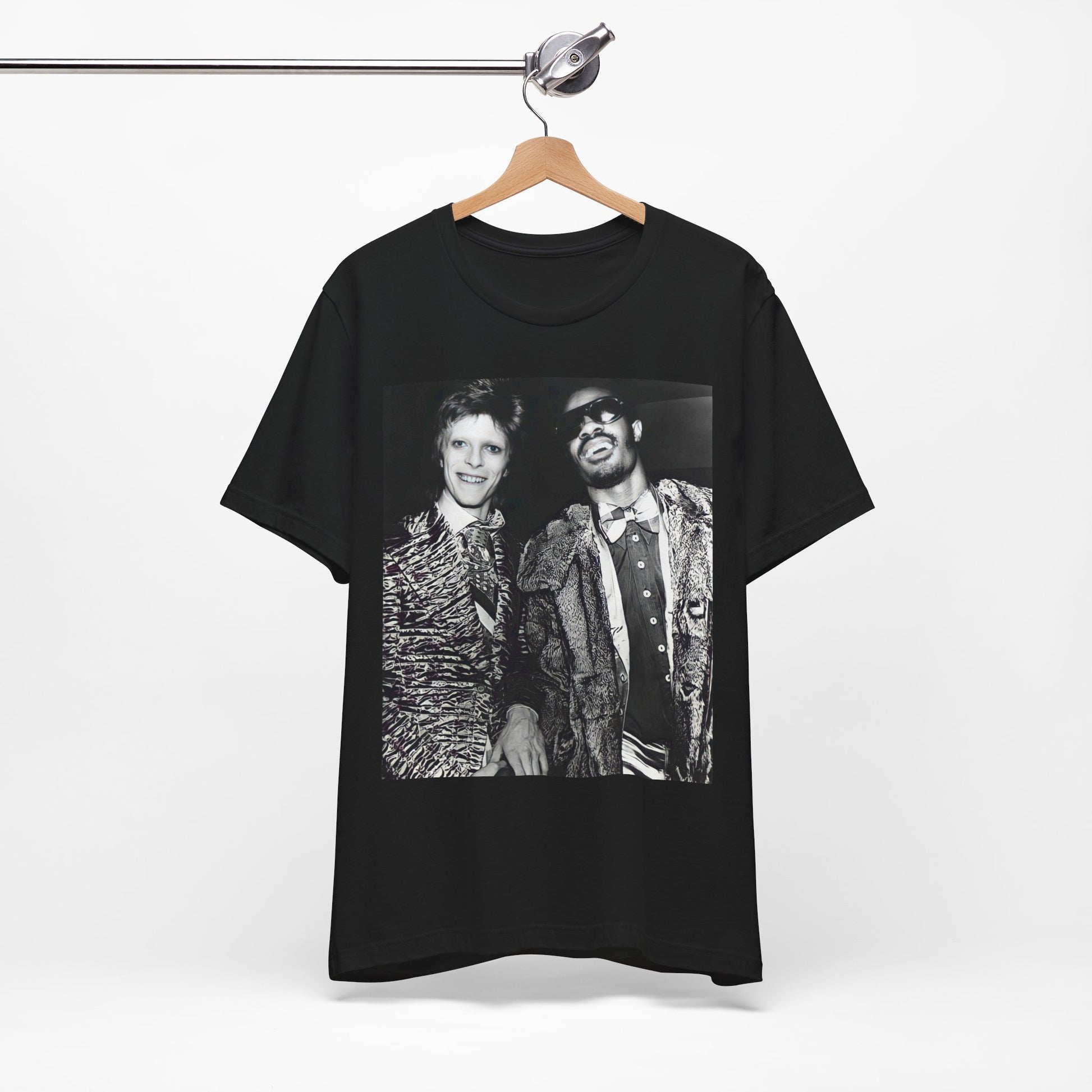 A black graphic t-shirt featuring a retro graphic of Stevie Wonder and David Bowie together.