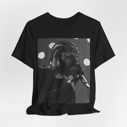 A black graphic t-shirt featuring a classic black and white style graphic of Drake.