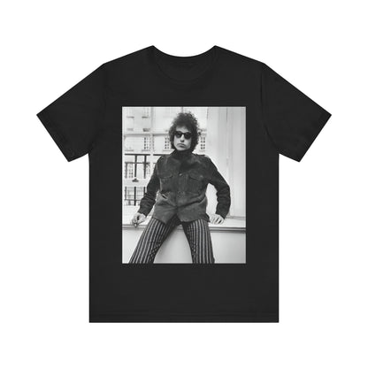A black graphic t-shirt featuring a graphic related to Bob Dylan's 'Highway 61' era, possibly with album art elements or iconic imagery.