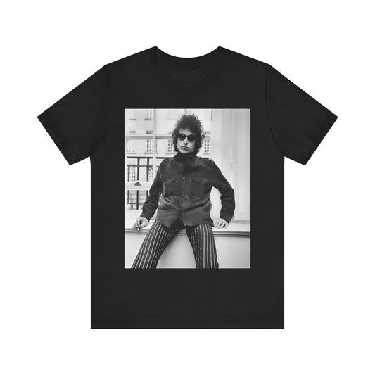 A black graphic t-shirt featuring a graphic related to Bob Dylan's 'Highway 61' era, possibly with album art elements or iconic imagery.