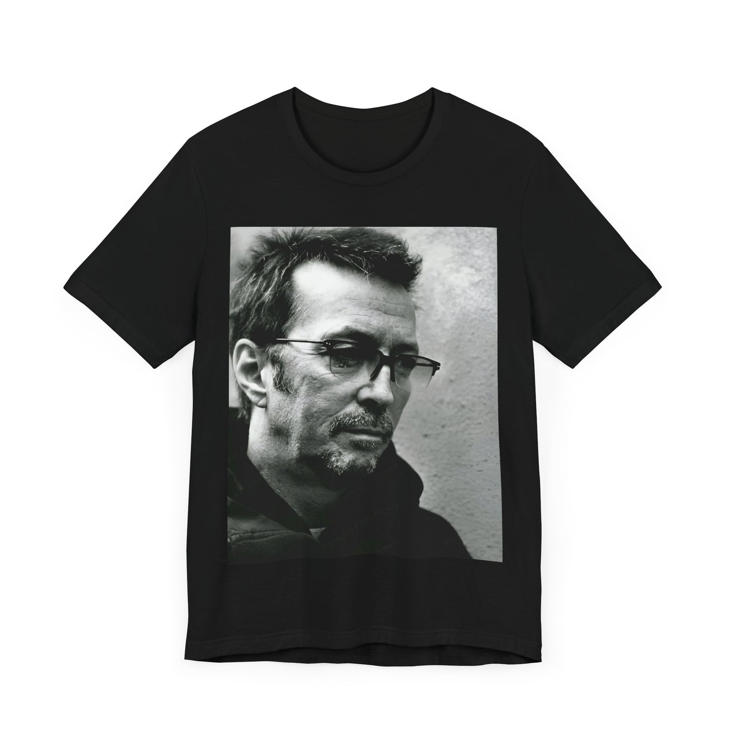 A black graphic t-shirt featuring a black and white, monochrome graphic or photo of Eric Clapton.