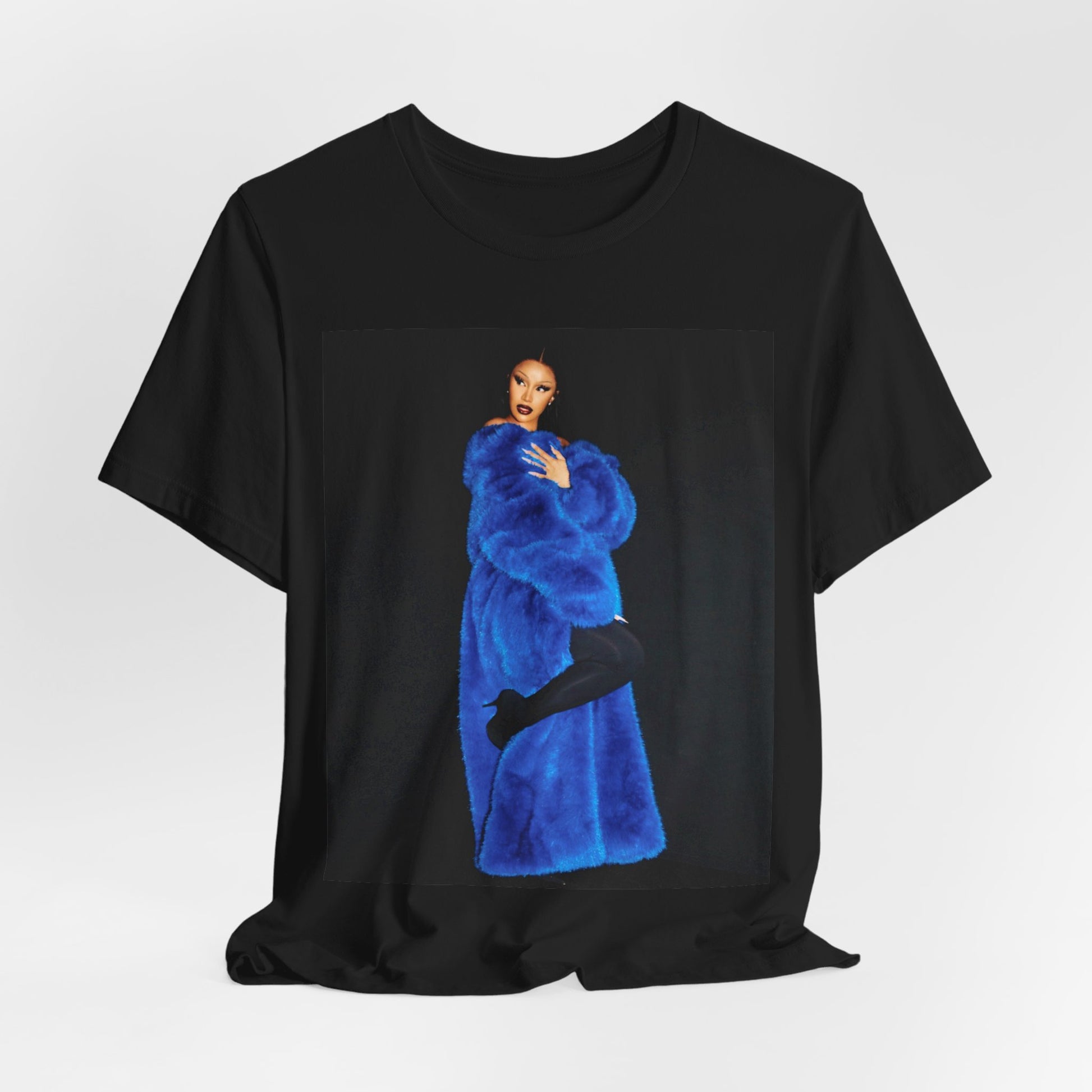 A black graphic t-shirt featuring a photo of Cardi B, possibly with blue velvet elements or a luxurious blue aesthetic.