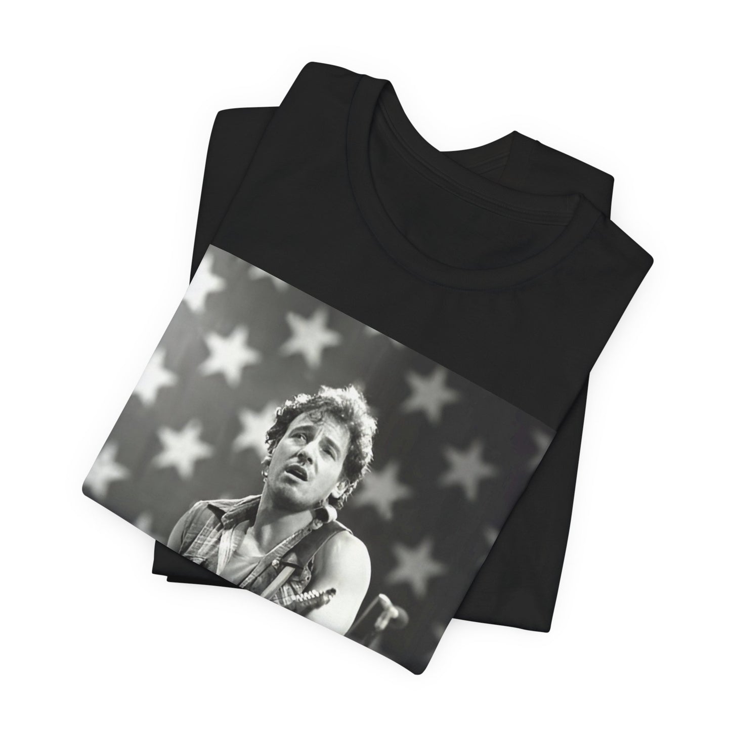 A black graphic t-shirt featuring a black and white graphic of Bruce Springsteen with an American flag background or elements.