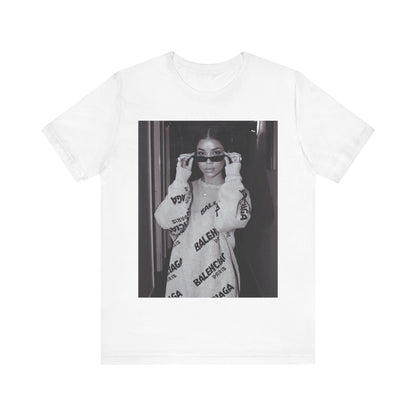 A black graphic t-shirt featuring a black and white, monochrome graphic or photo of Jhene Aiko.