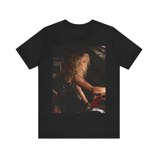 A black graphic t-shirt featuring a stylized graphic of Carrie Underwood as a Nashville royalty icon.