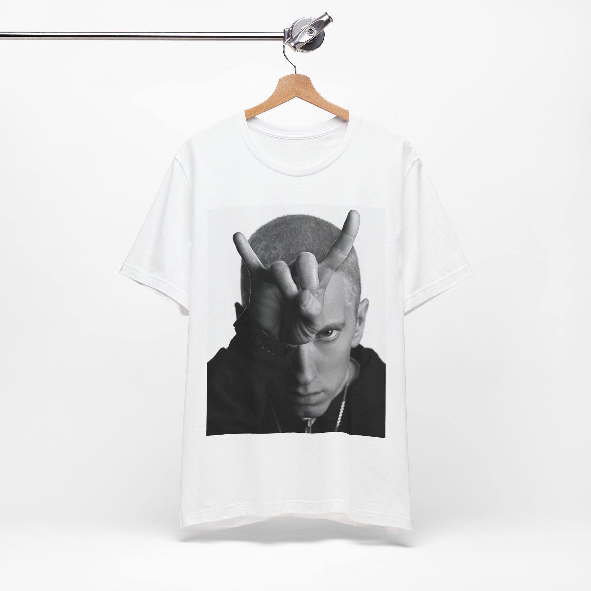 A black graphic t-shirt featuring a graphic related to Eminem's 'My Name Is' song or era.