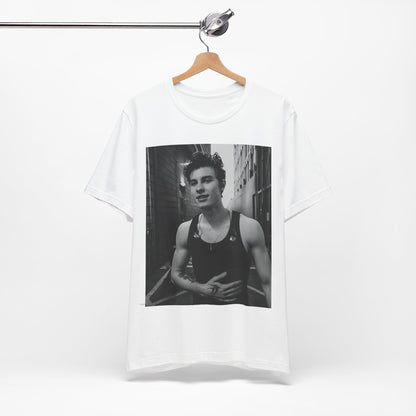 A black graphic t-shirt featuring a vintage black and white portrait graphic or photo of Shawn Mendes.