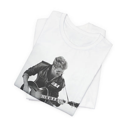 A black graphic t-shirt featuring a graphic of George Michael with a guitar.
