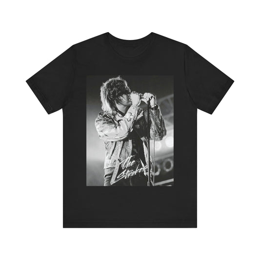 A black graphic t-shirt featuring a vintage graphic related to The Strokes' 'Last Nite' song or era.