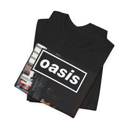 A black graphic t-shirt featuring a classic 90s rock and roll graphic of Oasis.