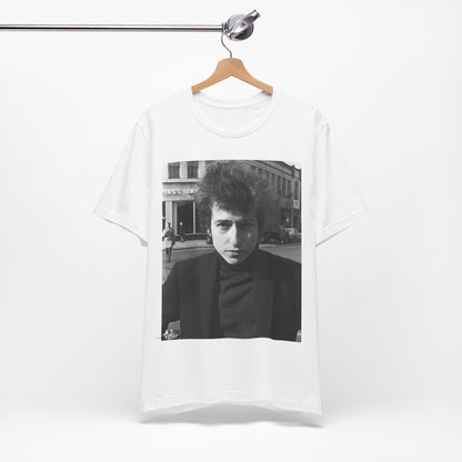 A black graphic t-shirt featuring a 60s black and white photo portrait of Bob Dylan.